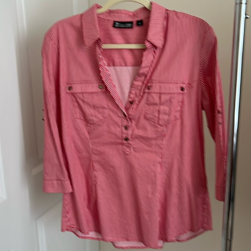 Red and white striped 3/4 length sleeve shirt.